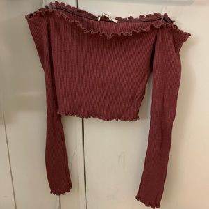 pink crop top with long sleeves